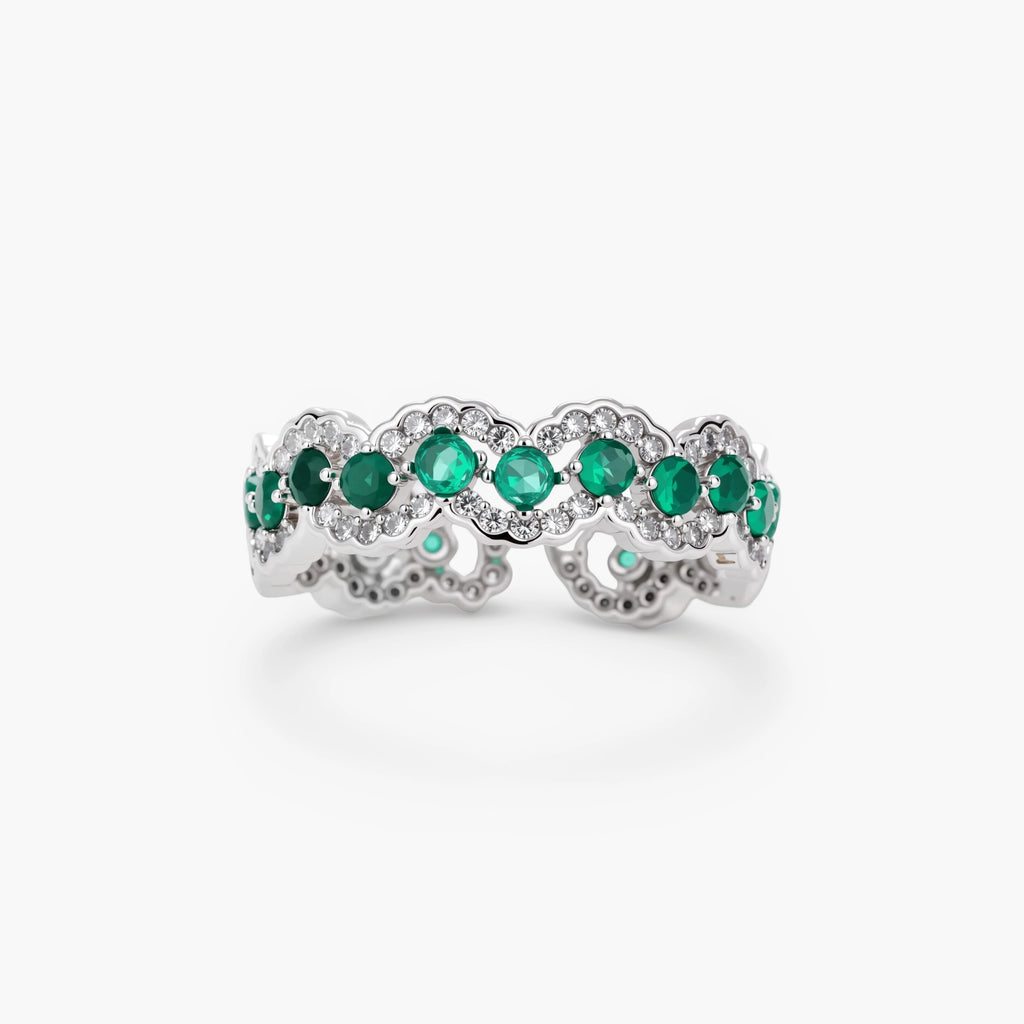 Platinum-plated copper ring with green zirconia stones in decorative scalloped wave pattern, adjustable band design.