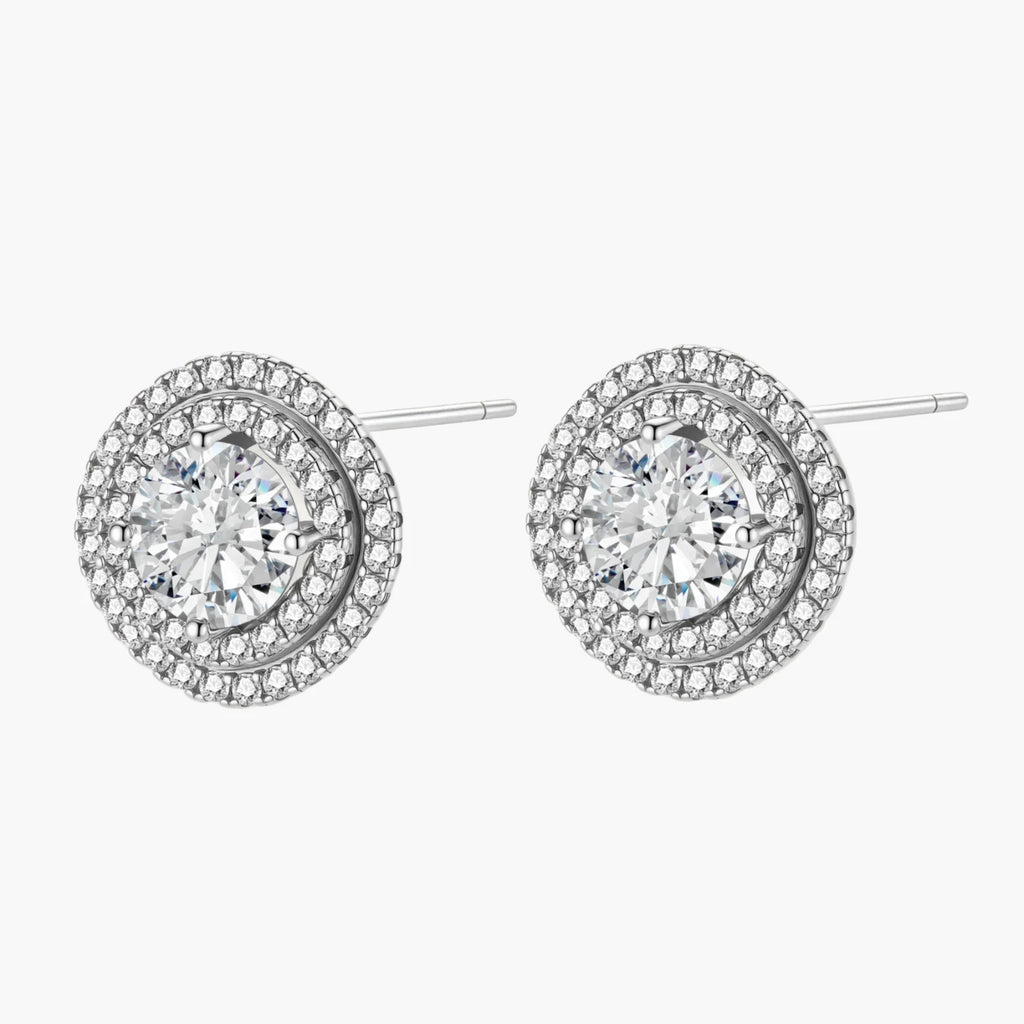 Double halo sterling silver stud earrings with brilliant round moissanite center stones and pavé crystal accents