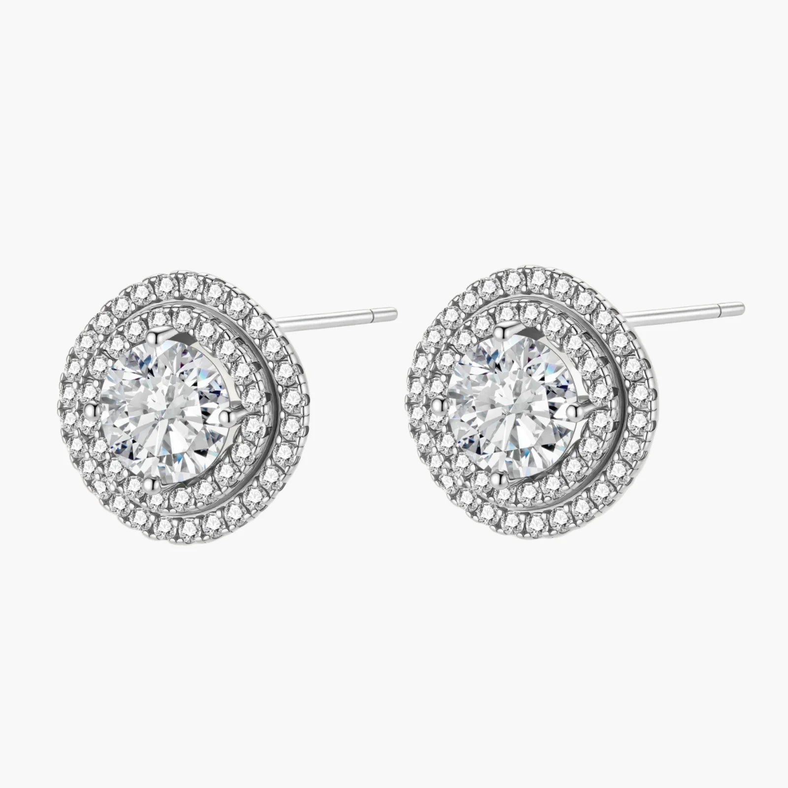 Double halo sterling silver stud earrings with brilliant round moissanite center stones and pavé crystal accents