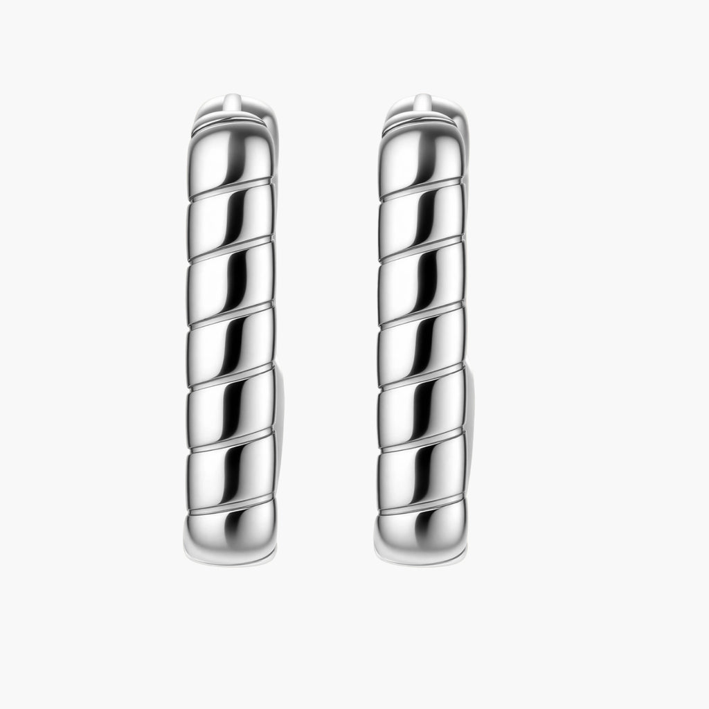 Close-up of platinum-plated sterling silver hoop earrings with horizontal textured grooves on white background.