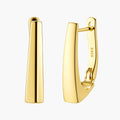 Sleek 14K gold-plated sterling silver huggie earrings with polished finish and geometric elongated design on white background.