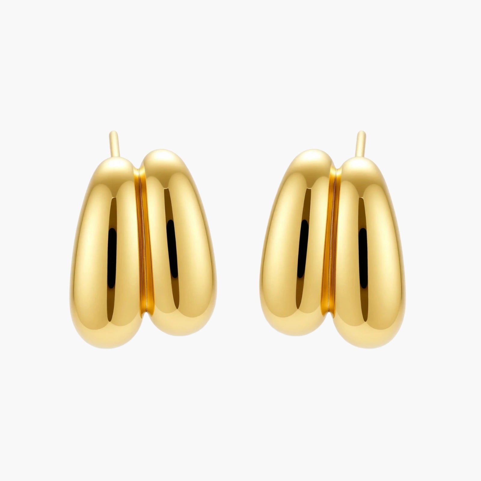 Chunky 18K gold-plated sterling silver hoop earrings with flowing sculptural curves on white background.