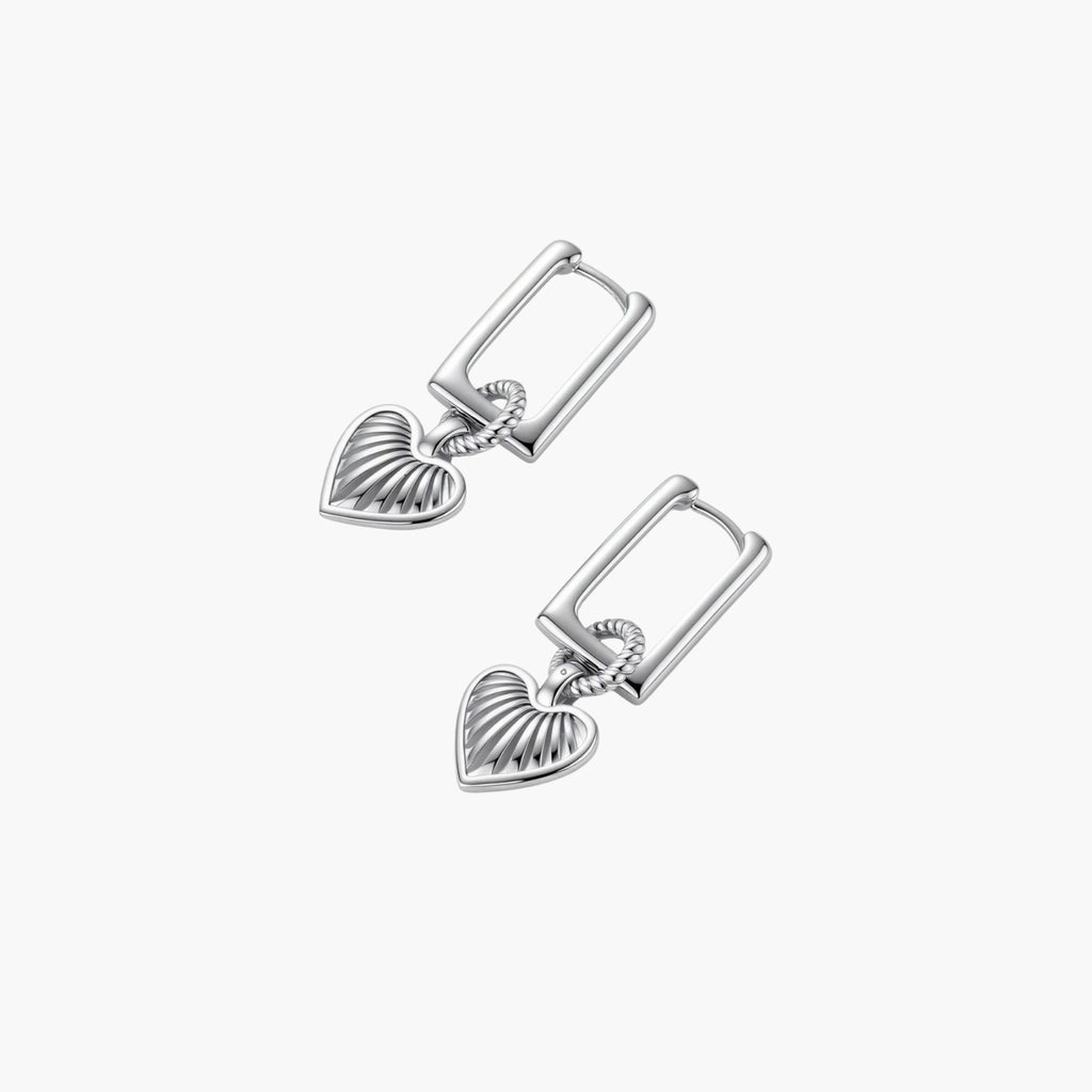 Platinum-plated 925 sterling silver rectangular hoop earrings with twisted ring connector and ribbed heart charm pendant.