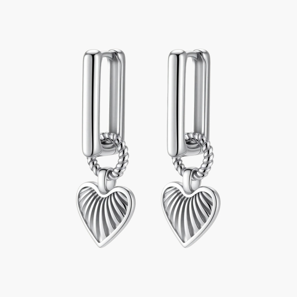 Platinum-plated 925 sterling silver rectangular hoop earrings with twisted ring connector and ribbed heart charm pendant.