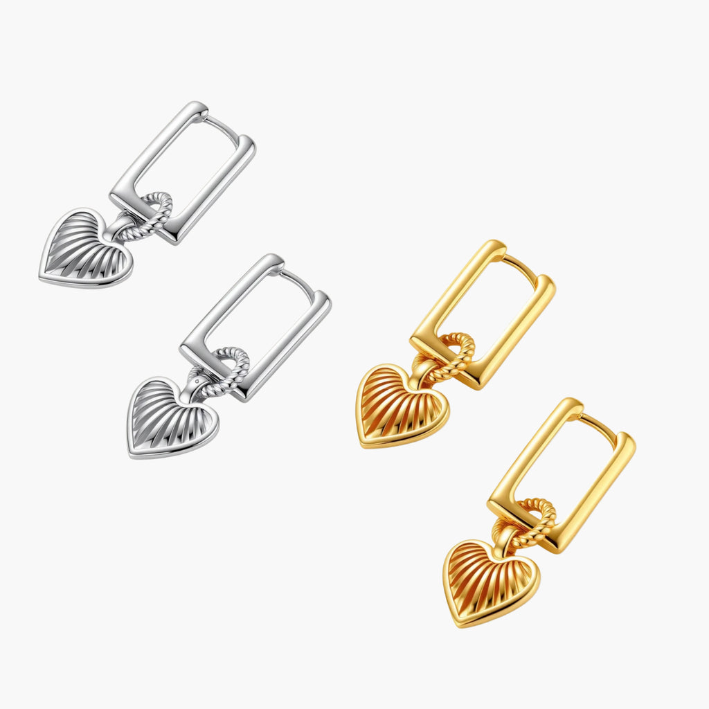 Platinum-plated 925 sterling silver rectangular hoop earrings with twisted ring connector and ribbed heart charm pendant.
