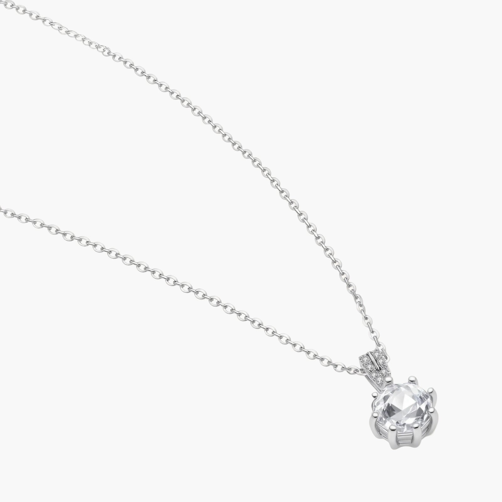 Platinum-plated sterling silver necklace with round clear crystal pendant and decorative bail on neutral background.
