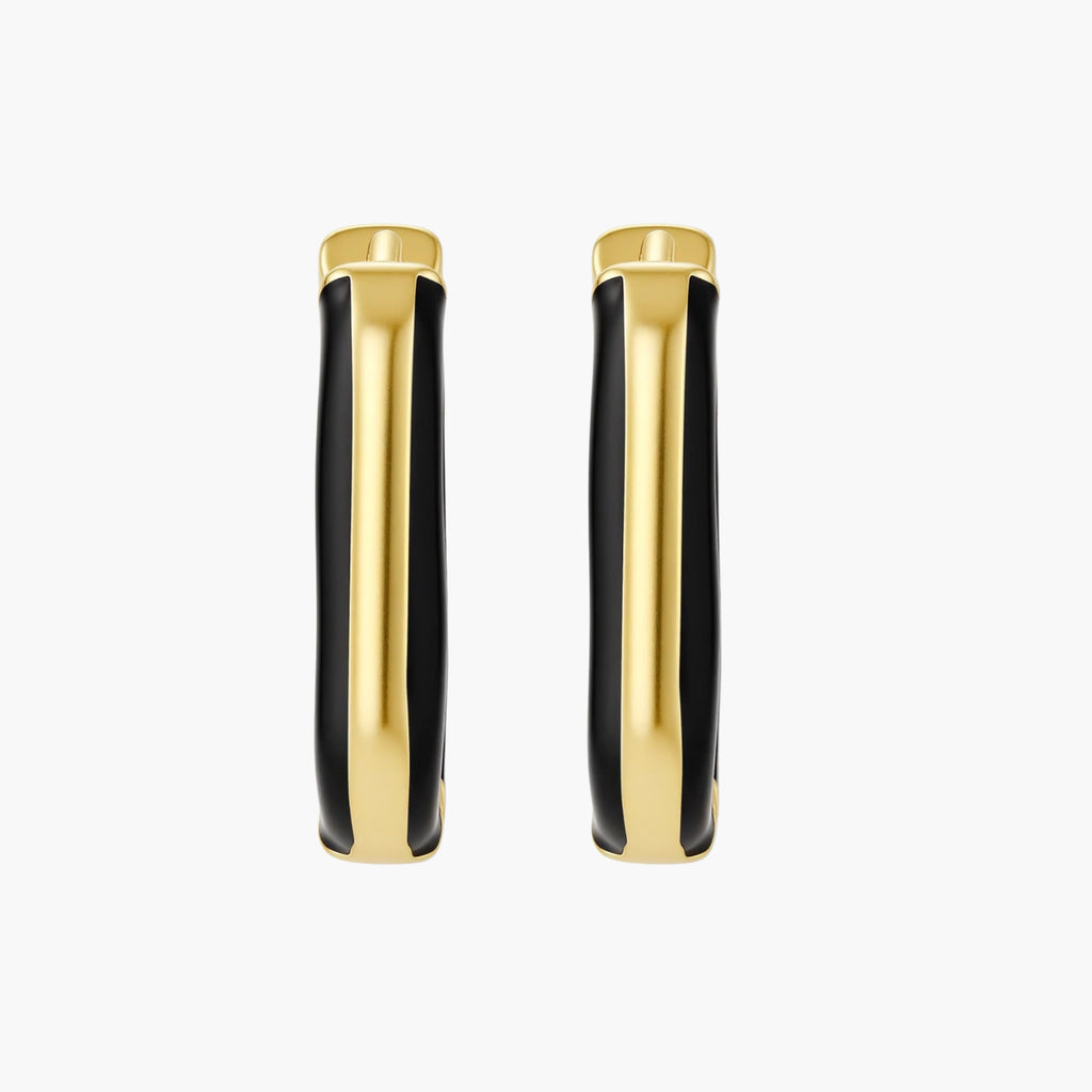 Modern hoop earrings with gold-plated and black sections, featuring hinged closure on white background.