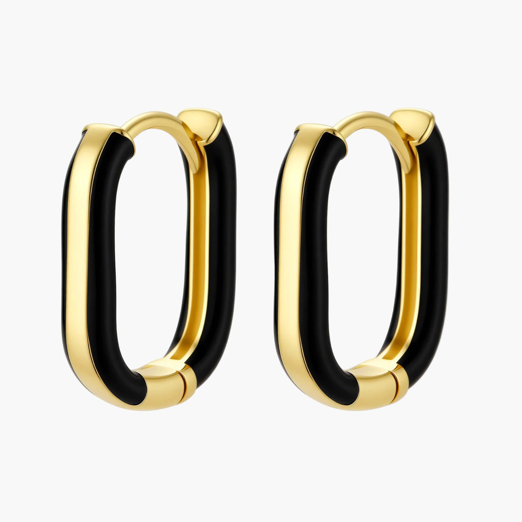 Modern hoop earrings with gold-plated and black sections, featuring hinged closure on white background.