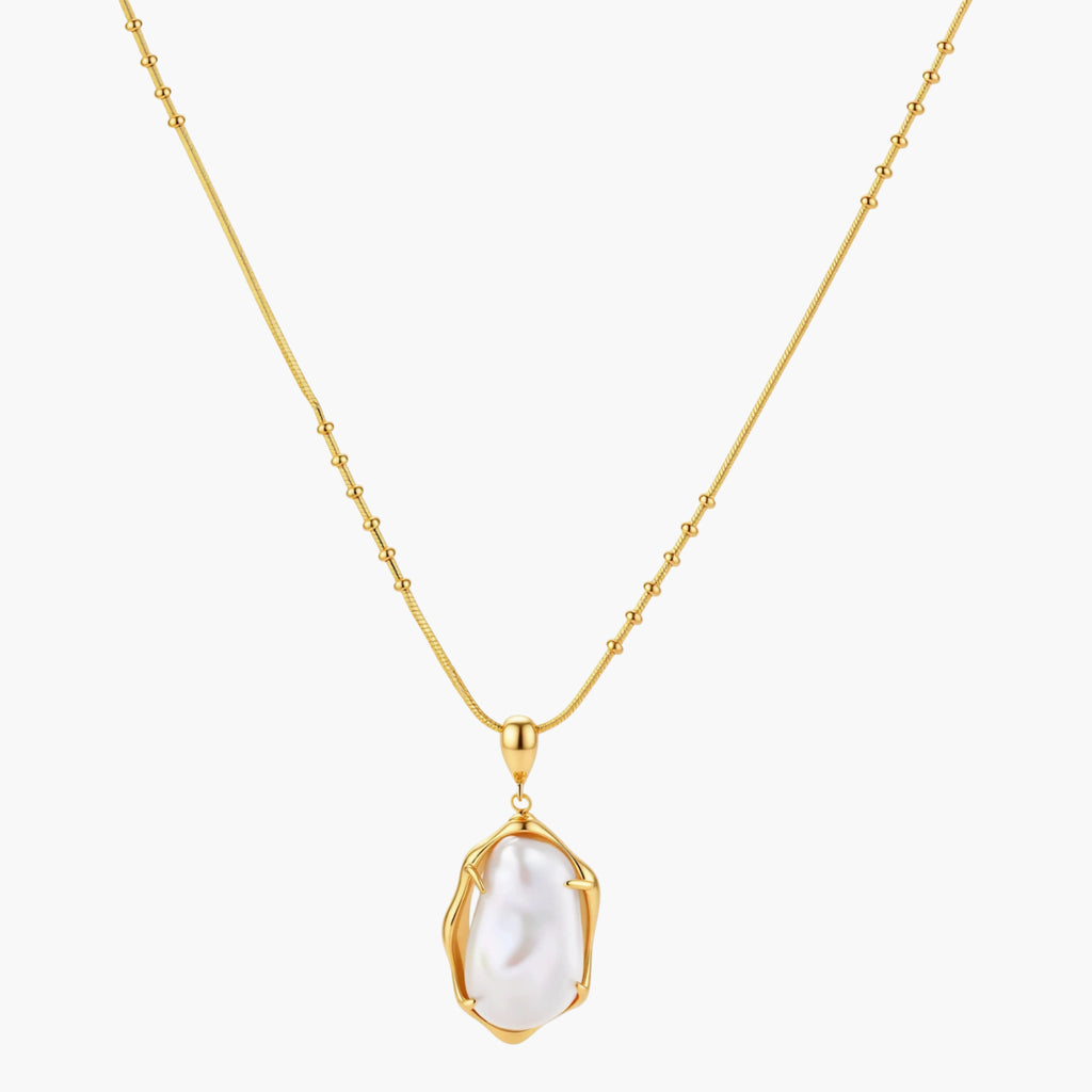 18K gold-plated sterling silver necklace with alternating bead chain and baroque pearl pendant on neutral background.