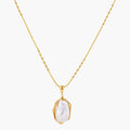 18K gold-plated sterling silver necklace with alternating bead chain and baroque pearl pendant on neutral background.