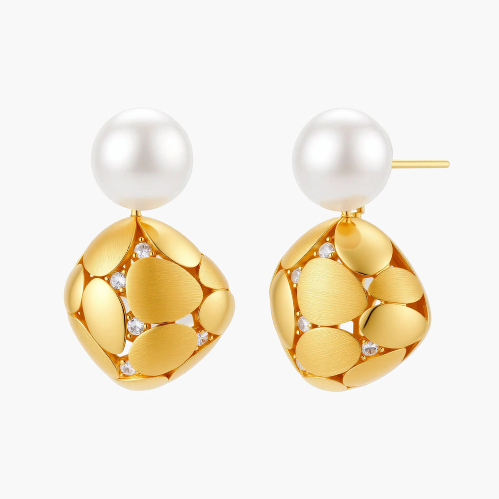 Gold-plated sterling silver drop earrings with white freshwater pearl studs and overlapping petal design with crystal accents