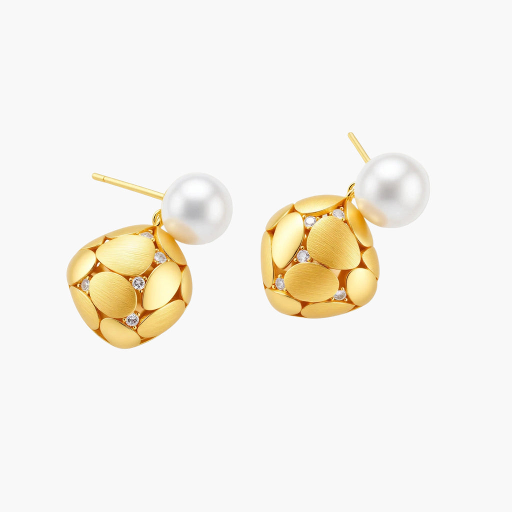 Gold-plated sterling silver drop earrings with white freshwater pearl studs and overlapping petal design with crystal accents