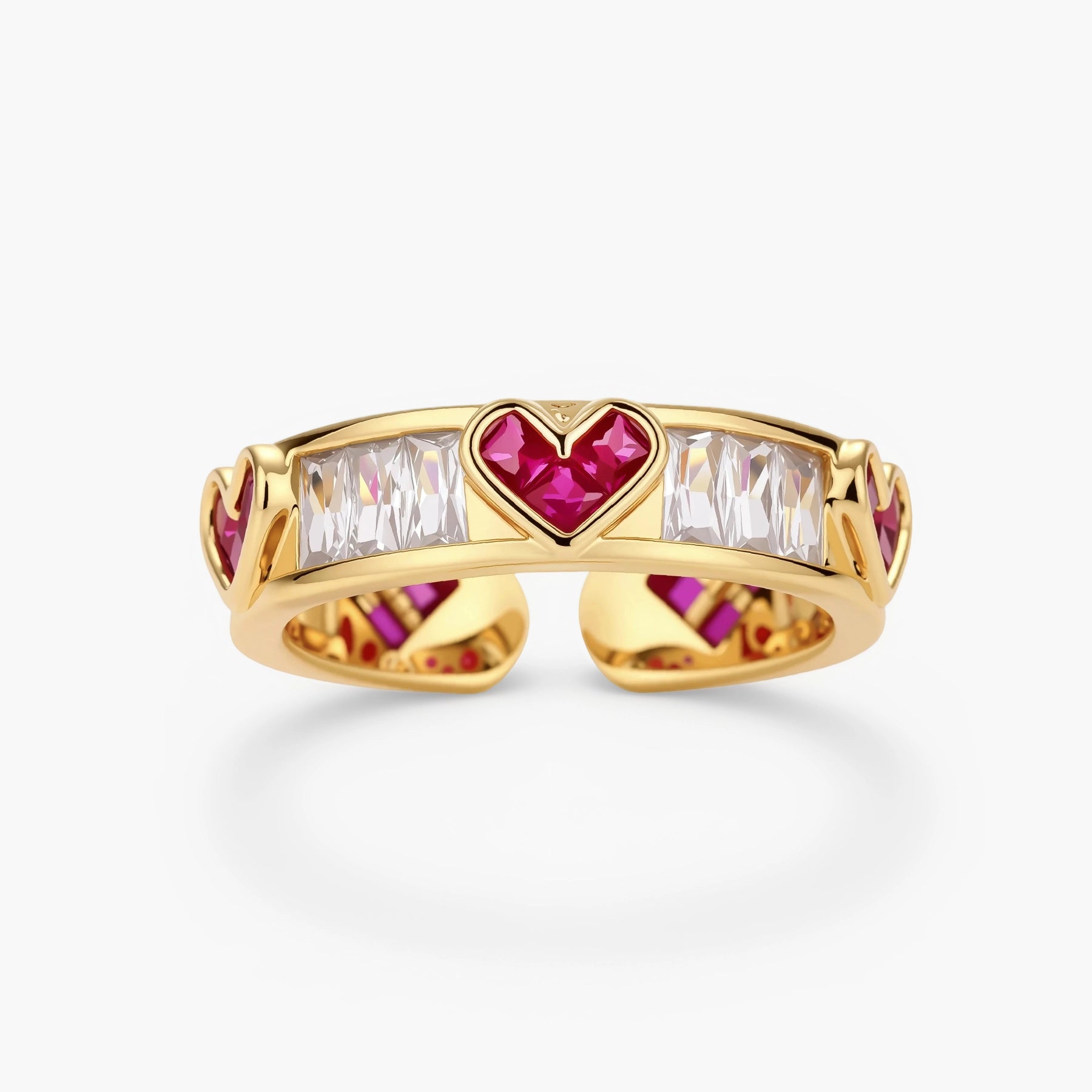 Gold-plated adjustable ring with alternating red heart-shaped and clear rectangular zirconia stones in geometric pattern
