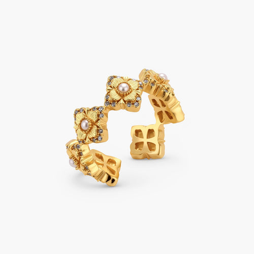 Gold-plated adjustable ring with multiple flower motifs, each featuring a central pearl and cubic zirconia stones