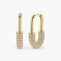 Gold-plated huggie hoop earrings with pavé zirconia stones covering the bottom curve, shown in open and closed positions.