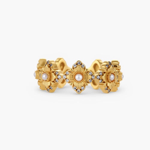 Gold-plated adjustable ring with multiple flower motifs, each featuring a central pearl and cubic zirconia stones
