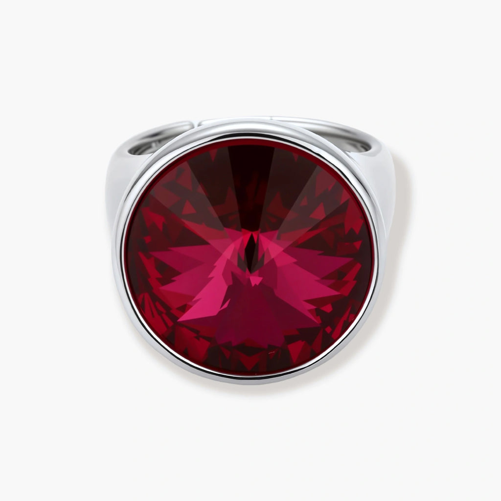 Large burgundy zirconia stone in sleek palladium-plated bezel setting on white background, showing brilliant faceted cut.