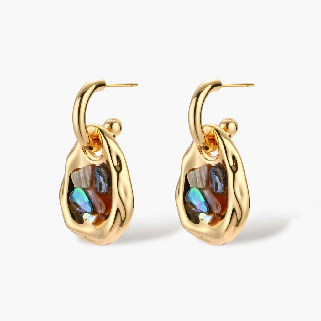 Gold-plated convertible hoop earrings with iridescent shell mosaic pendants, shown assembled and separated on cream background.