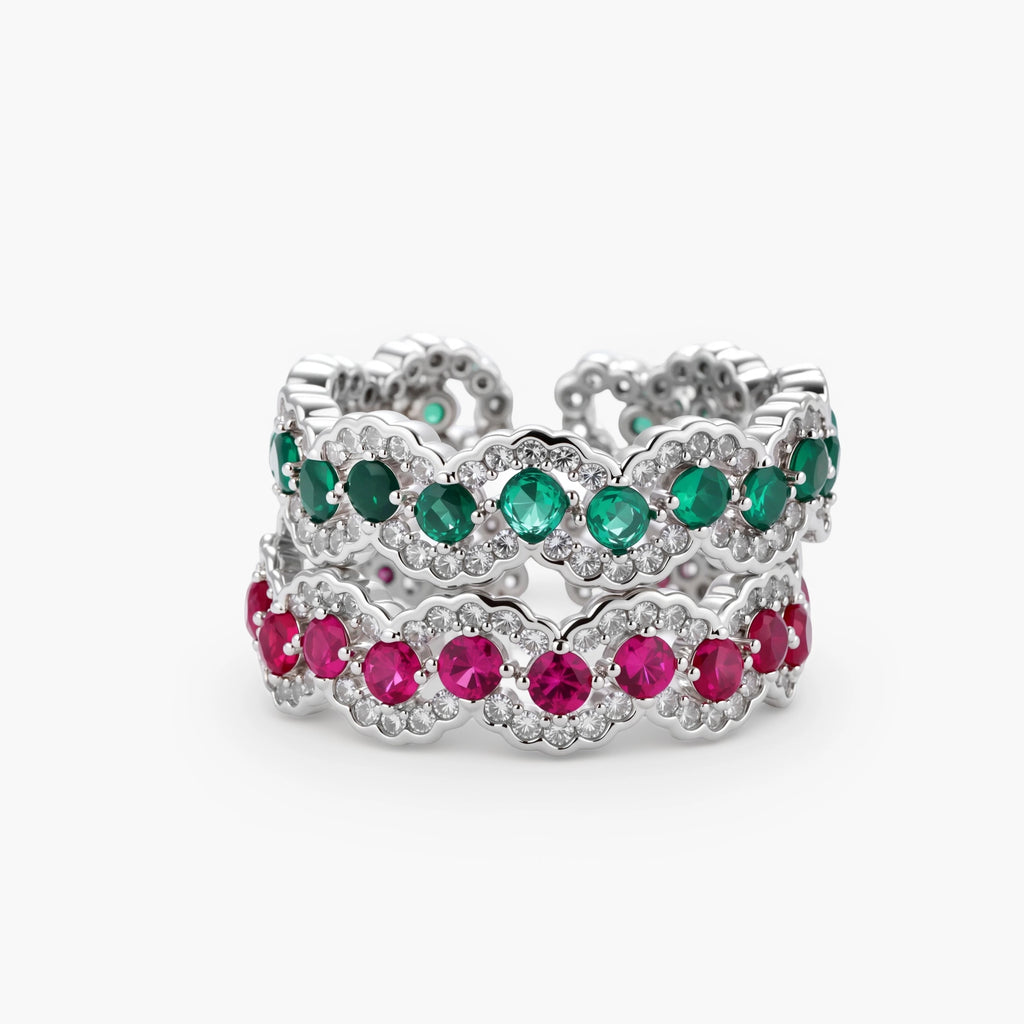 Platinum-plated copper ring with green zirconia stones in decorative scalloped wave pattern, adjustable band design.