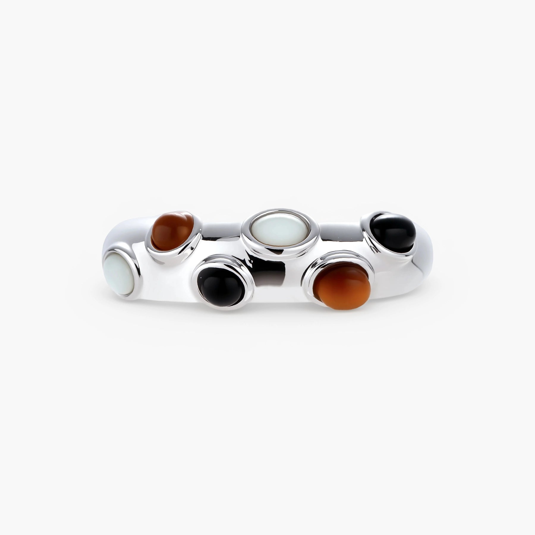 Adjustable platinum-plated ring with multiple oval cabochon stones in black, amber, and white tones on neutral background.