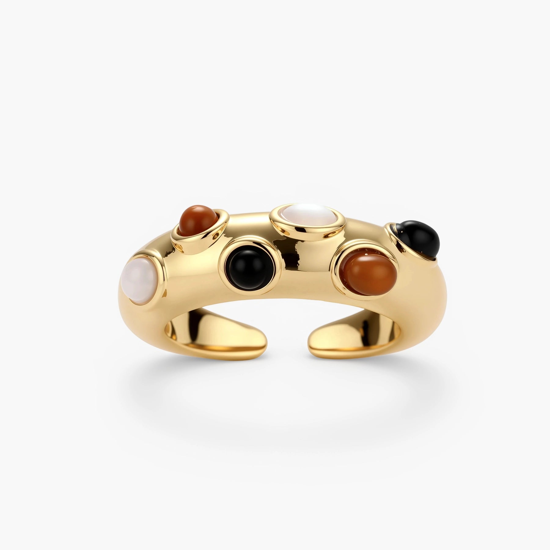 Gold-plated adjustable ring with white, amber, and black stones in organic bubble design on neutral background.